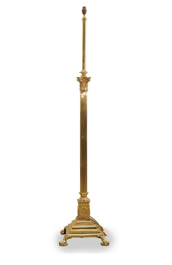 A brass standard lamp, late 19th century, (1 of 3)