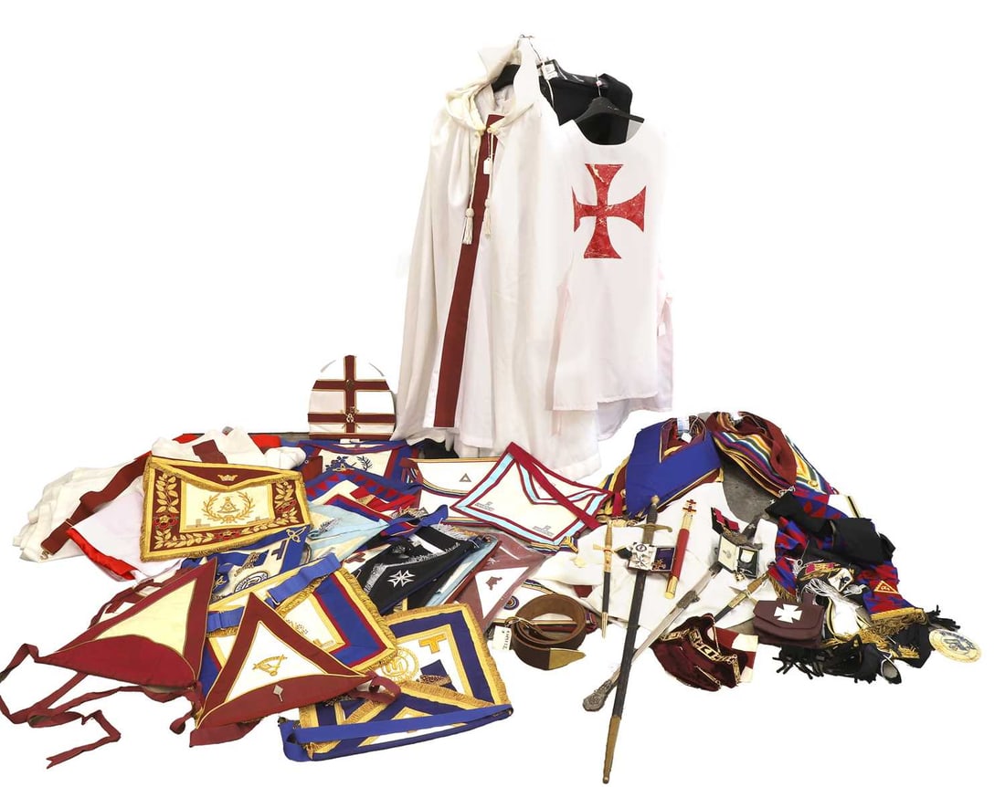 A large collection of Masonic regalia,: A large collection of Masonic regalia, to include, a chained collar on red velvet, a medal of a cross, boxed, a medal of an eagle, possibly Maltese, boxed, two medals with red ribbons, medal