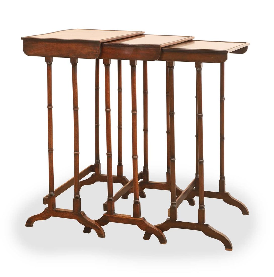 A nest of three mahogany tables, 19th century, (1 of 2)