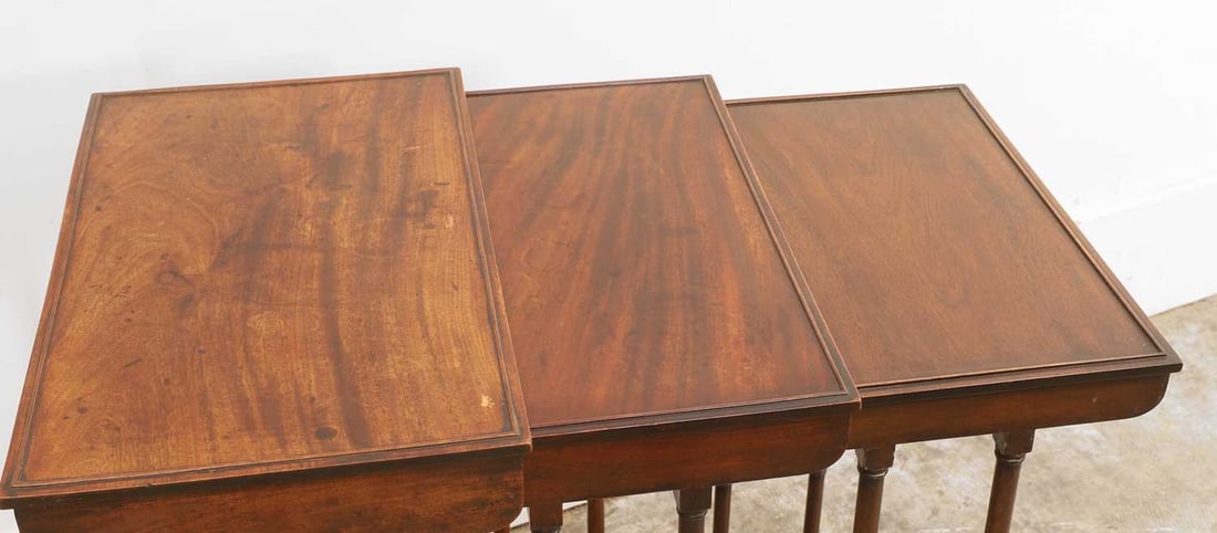 A nest of three mahogany tables, 19th century, - 2