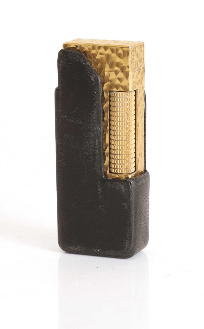 A Dunhill gold plated Rollagas lighter, c.1970s: A Dunhill gold plated Rollagas lighter, c.1970s with 'Bark' texture, within Dunhill branded leather case, 2.5cm wide 6.5cm high
