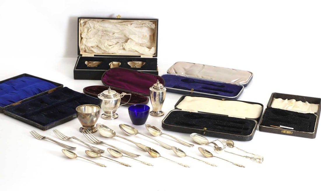An assortment of silver items,: An assortment of silver items, to include various cased christening sets and a cruet set, a sugar bowl, mustard pot and pepperette by S Lesser & Sons Ltd, Birmingham, 1858, six spoons and sugar