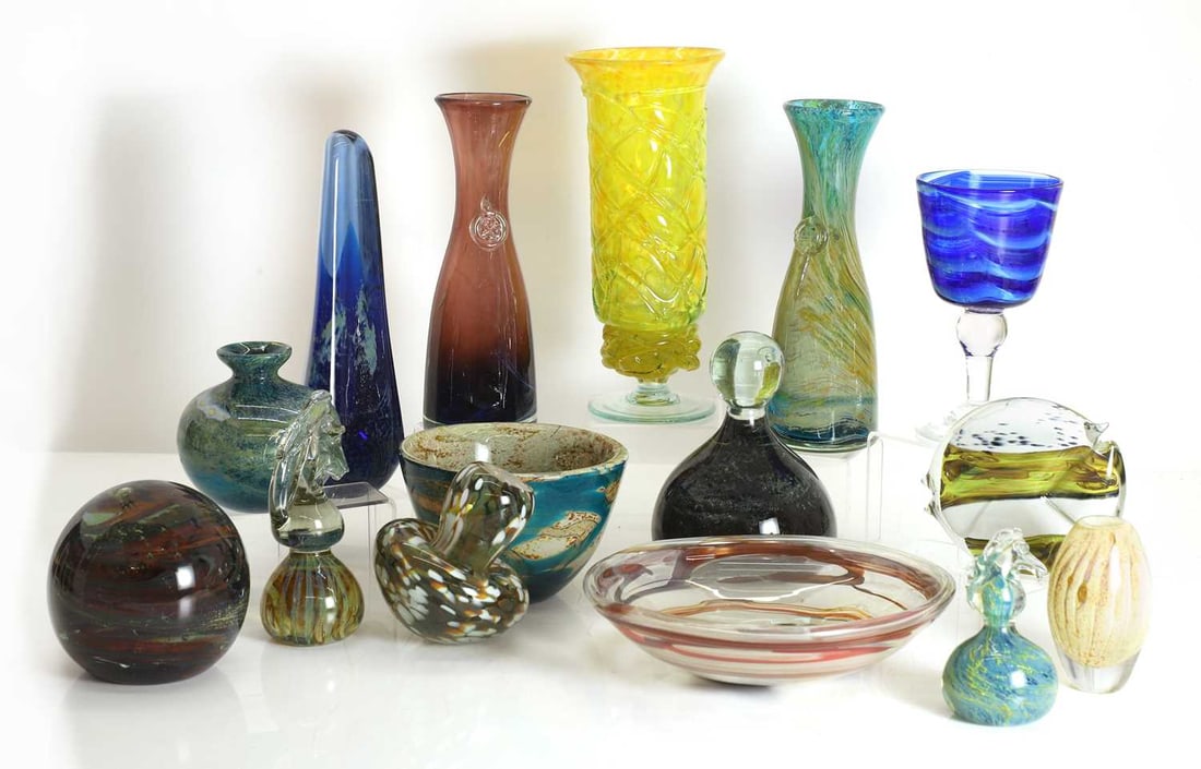 A collection of Mdina glass items, 20th century, Malta,: A collection of Mdina glass items, 20th century, Malta, comprising vases, bowls, and paperweights, together with a Phoenician vase tallest 25.5cm 15 Condition Report: Phoenician vase with a small