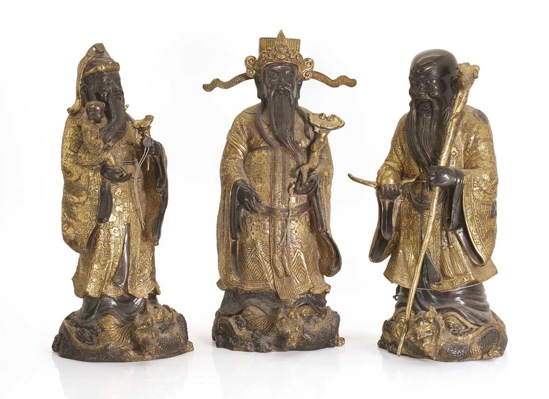 Three Chinese gilt-brass figures of of 'Lu', 'Fu' and 'Shou', early 20th century, (1 of 2)
