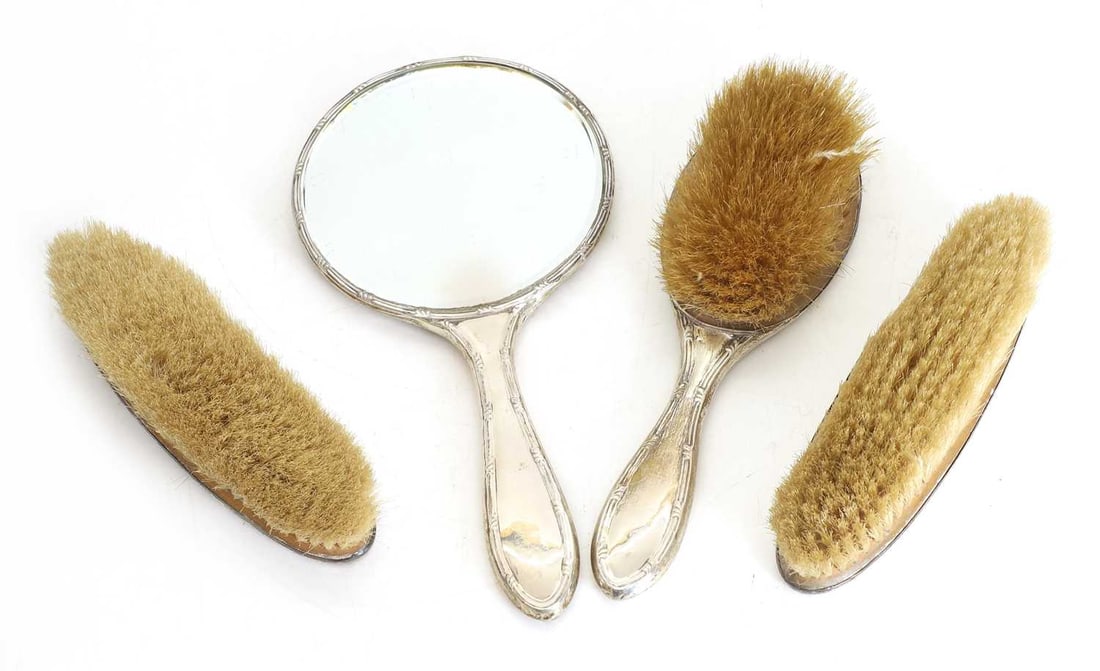 A silver handled brush set, (1 of 2)