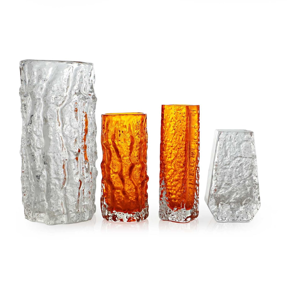 Geoffrey Baxter (British, 1922-1995) for Whitefriars, four 'Textured Range' vases, circa 1970,: Geoffrey Baxter (British, 1922-1995) for Whitefriars, four 'Textured Range' vases, circa 1970, comprising Bark, Nailhead, and Coffin vases, Nos. 9689, 9691, 9683 and 9686, in Flint and Tangerine