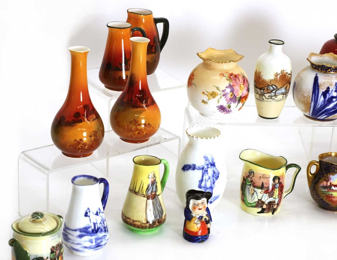 A large collection of Doulton miniatures, - 2