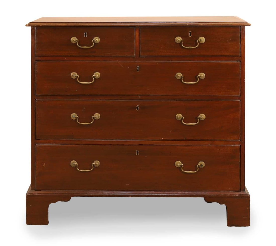 A George III mahogany chest of drawers, early 19th century, (1 of 2)