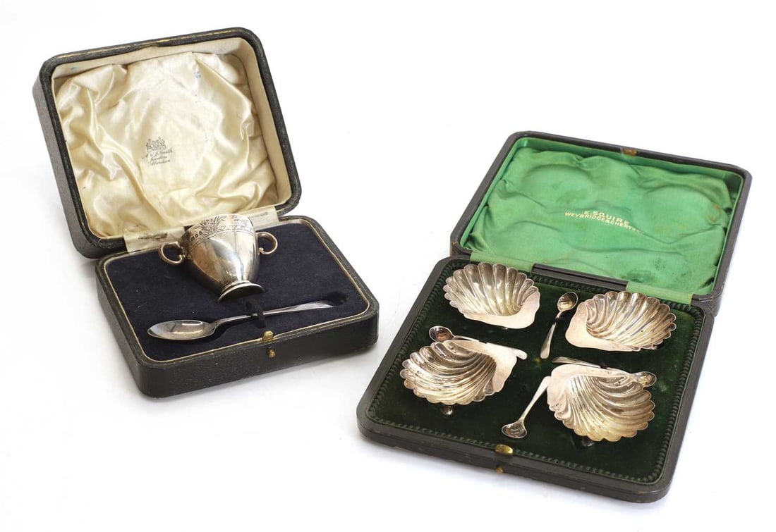 A silver set of four silver salts and spoons, (1 of 2)