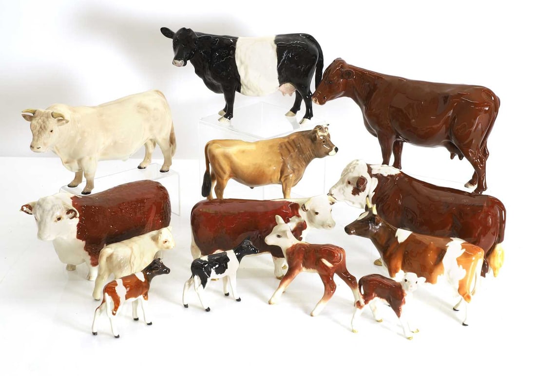 A collection of Beswick cows and calves,: A collection of Beswick cows and calves, to include a model of a Hereford cow stamped 'CH OF CHAMPIONS', a bull stamped 'CH OWNSLEY COY.BOY', two other models of bulls, and five calves, and other