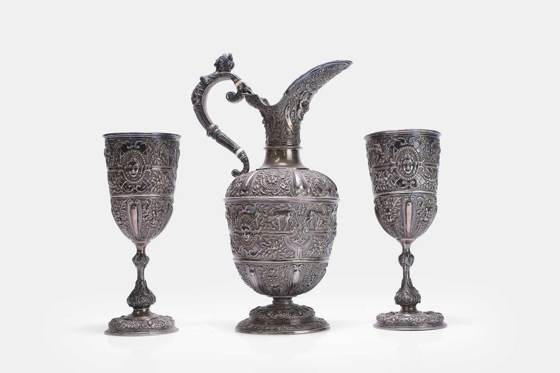 A Victorian silver 'Cellini' pattern ewer and two goblets, by Stephen Smith & Son, London, 1867, (1 of 3)