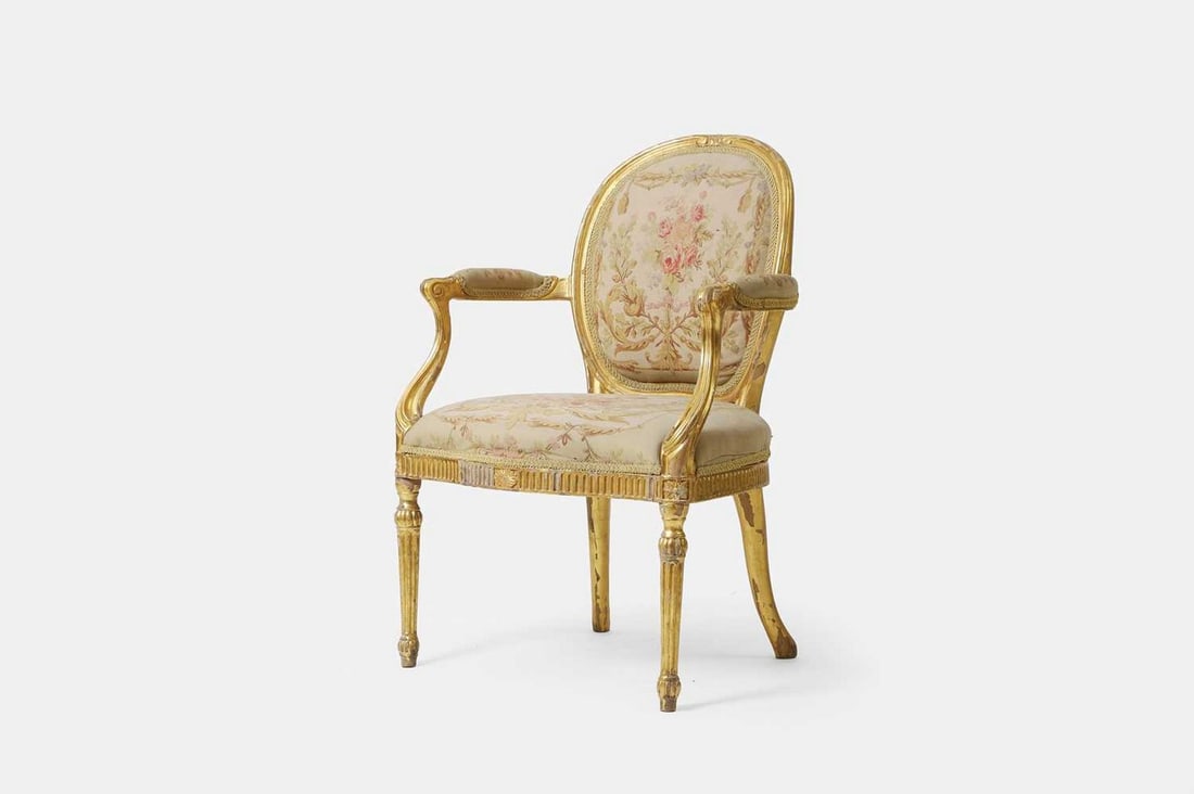 A George III giltwood armchair attributed to Ince & Mayhew, circa 1775, (1 of 3)