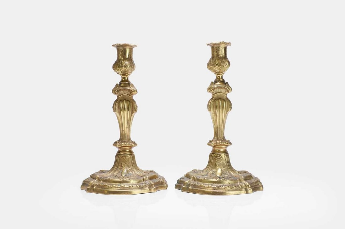 A pair of Louis XV ormolu candlesticks, mid-18th century, French, (1 of 3)