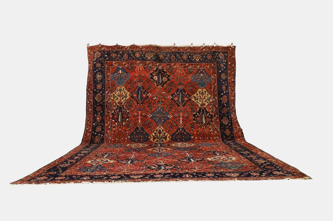 A Persian Bakhtiari wool carpet, first half 20th of the century, (1 of 3)