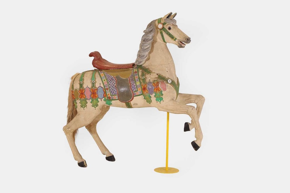 A wooden fairground horse figure, 20th century, (1 of 3)
