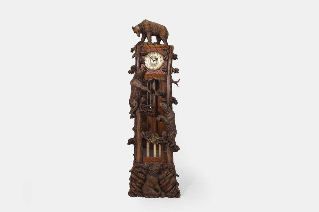 A Black Forest carved wooden longcase clock, circa 1930, Swiss, (1 of 3)