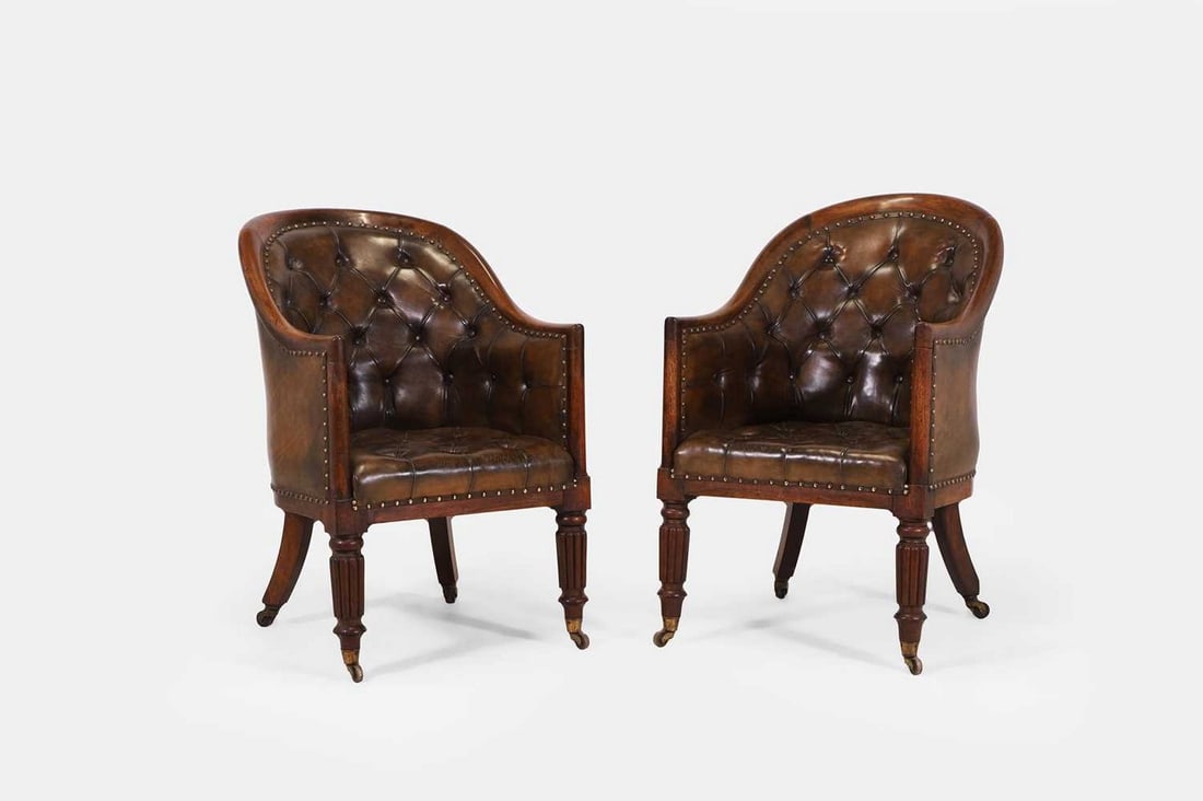 A pair of George IV rosewood library chairs, circa 1825, (1 of 3)