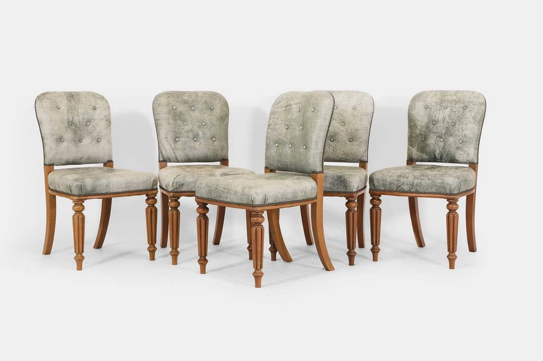 A set of five George IV-style mahogany and leather dining chairs by Robert Kime, of recent (1 of 4)