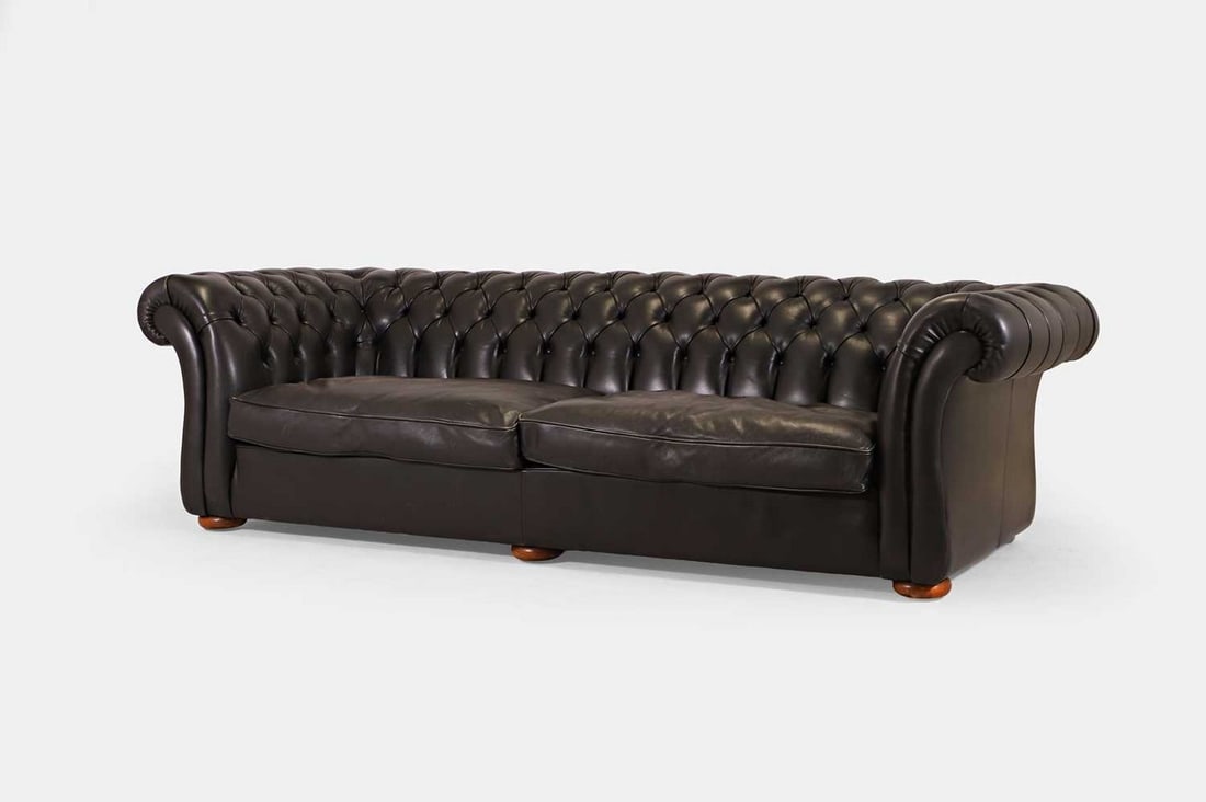 A large two-piece chesterfield sofa by Terence Conran, of recent manufacture, (1 of 3)