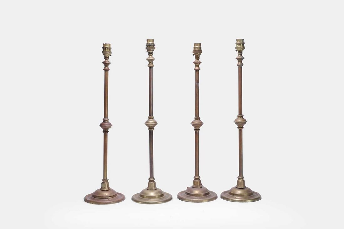 A set of four brass table lamps, 20th century, (1 of 3)