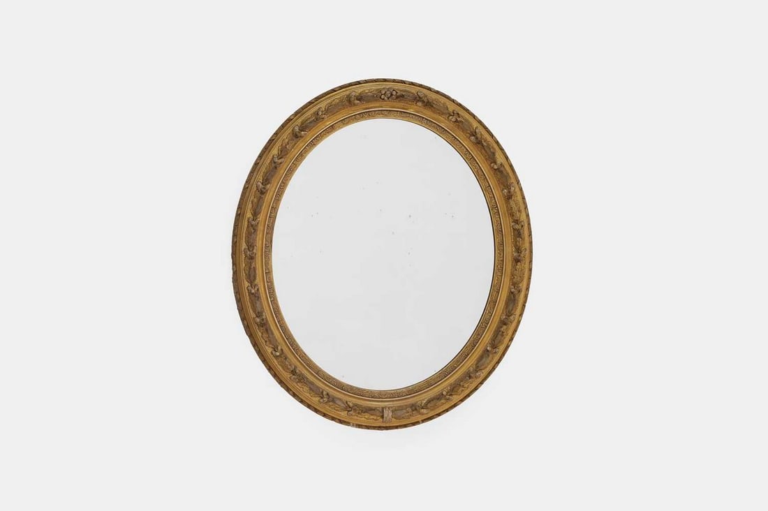 An Victorian oval giltwood wall mirror, 19th century, (1 of 3)