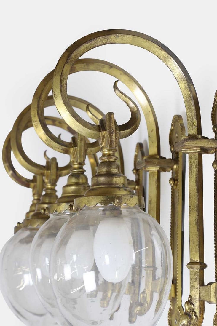 A set of four Gothic Revival lacquered gilt-bronze wall lights, late 19th/early 20th century, (1 of 3)