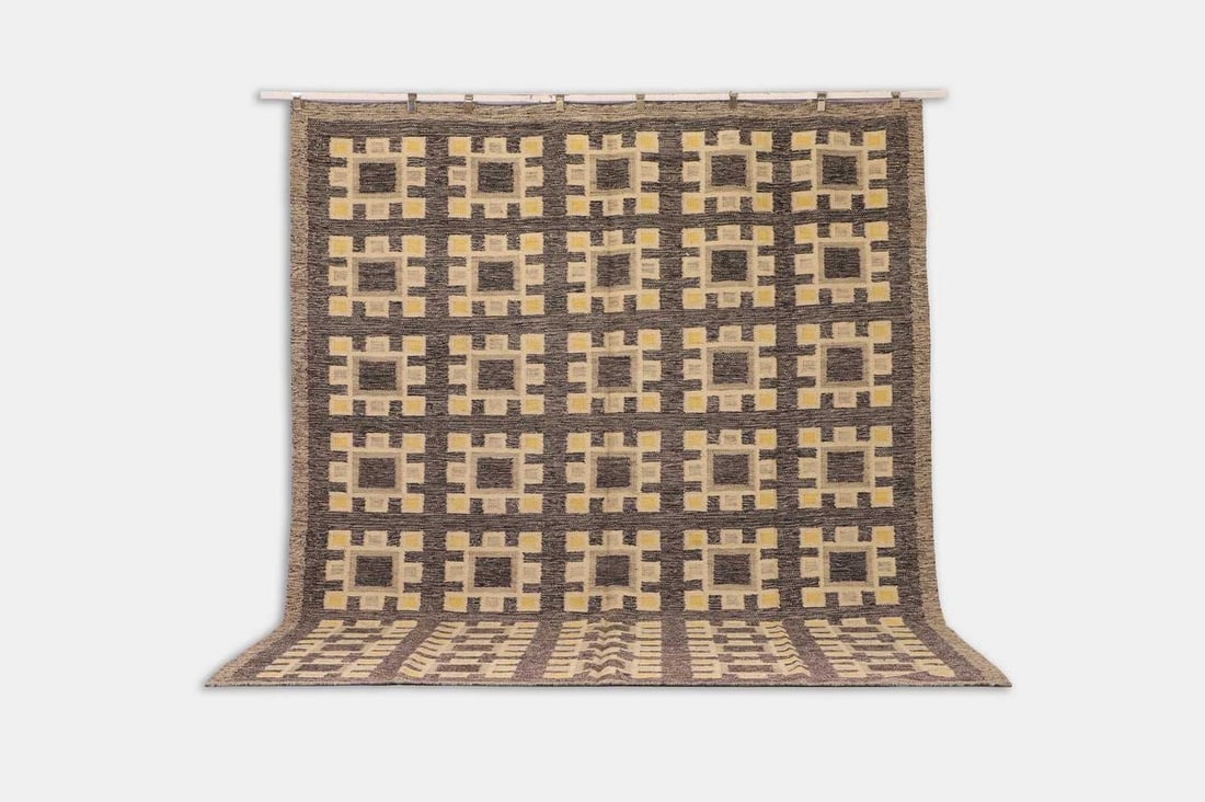 A flat-weave wool carpet in the style of Barbro Nilsson, of recent manufacture, (1 of 3)