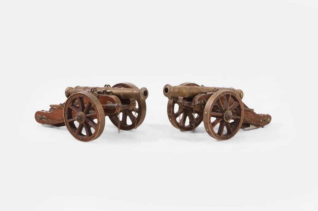 A pair of brass desk cannons, 20th century, (1 of 3)