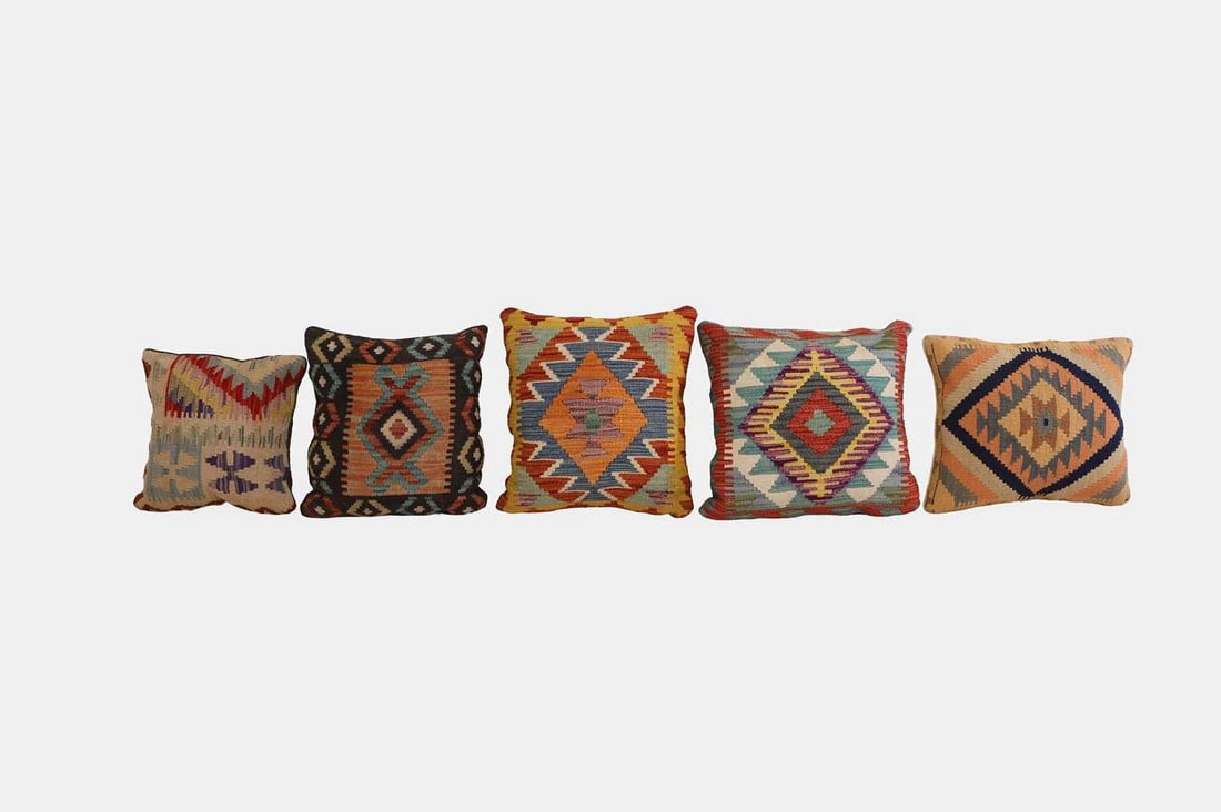 A group of five kilim cushions, of recent manufacture, (1 of 3)