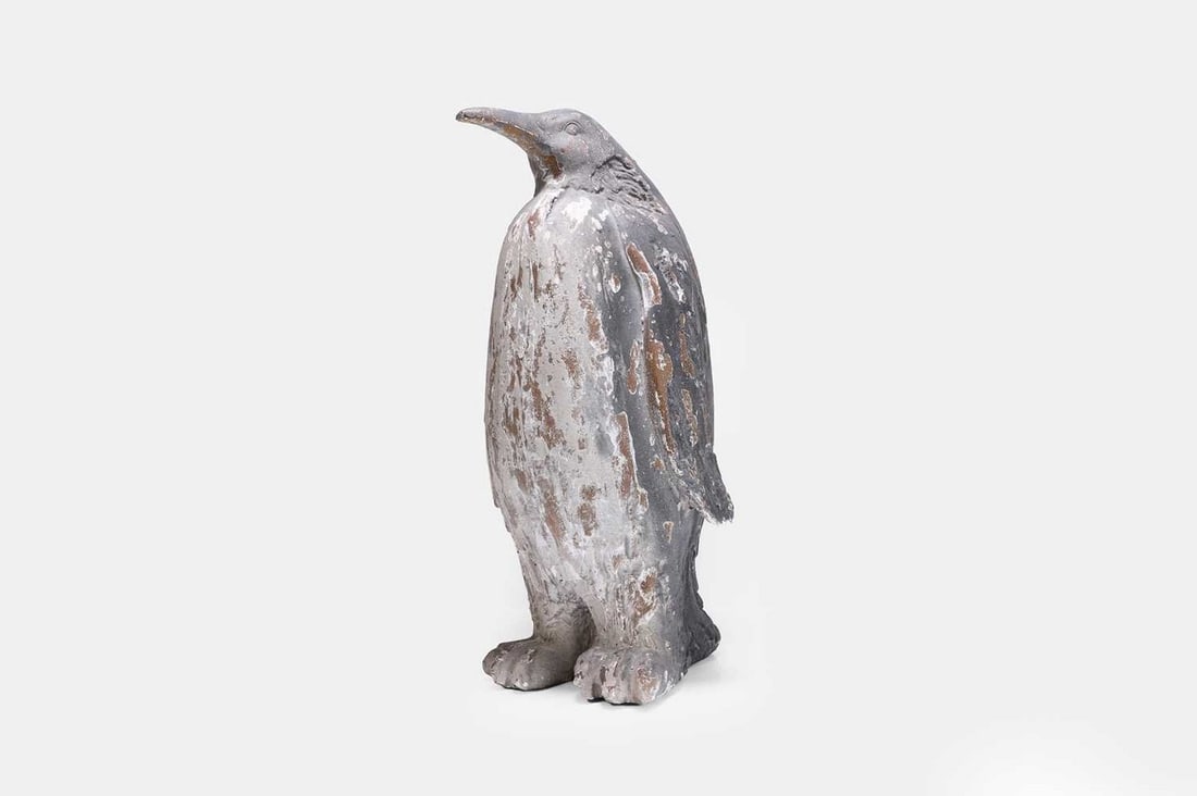 A painted plaster penguin, mid-20th century, probably French,: A painted plaster penguin, mid-20th century, probably French, realistically modelled as an emperor penguin (23cm wide, 25cm deep, 54.5cm high) Condition Report: Painted surface flaking giving an attra