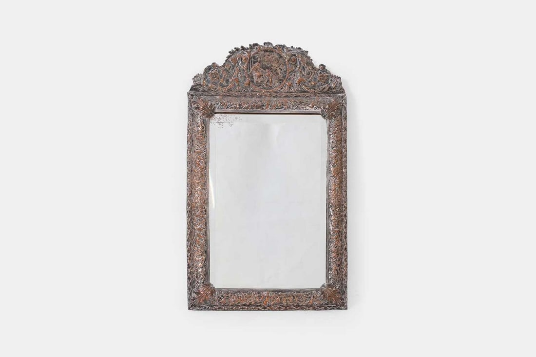 A silvered-copper repoussé mirror, 19th century, (1 of 3)