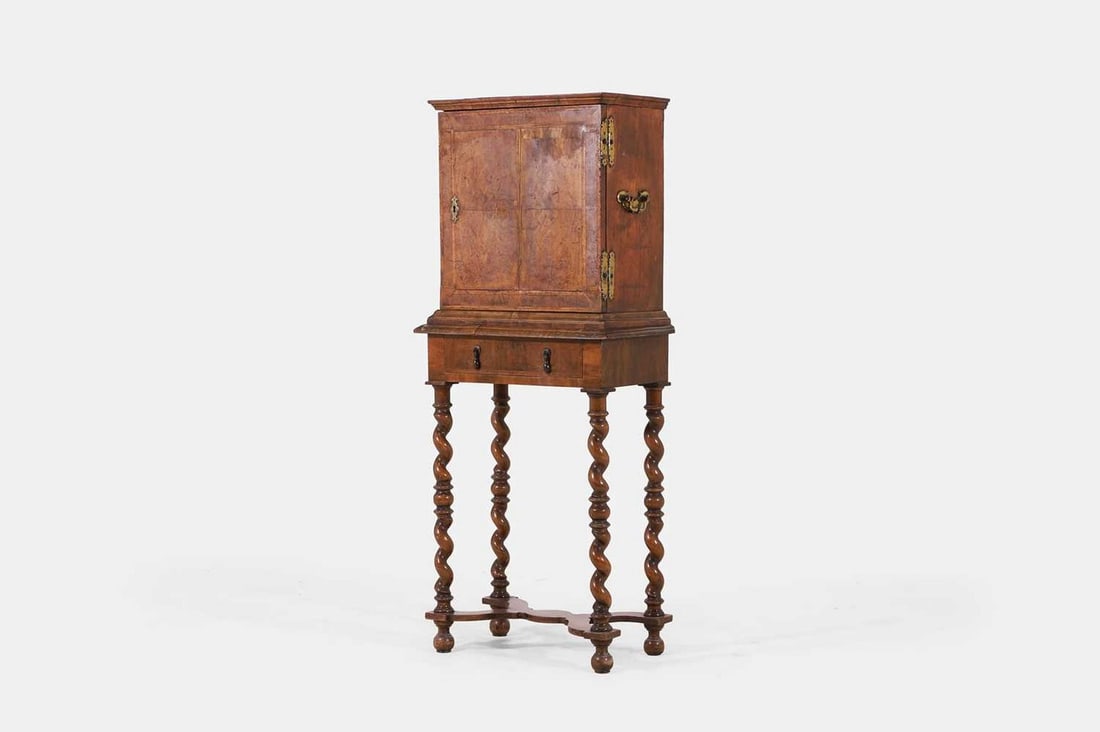 A George I walnut cabinet-on-stand, circa 1720, (1 of 3)