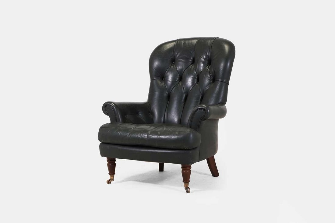 A leather club armchair, 20th century, (1 of 3)