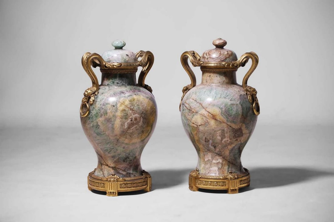 A pair of Louis XV-style green fluorspar and ormolu vases, second half of the 19th century, French,: A pair of Louis XV-style green fluorspar and ormolu vases, second half of the 19th century, French, each of baluster form, the domed cover flanked by scrolling acanthus handles terminating in dragon h