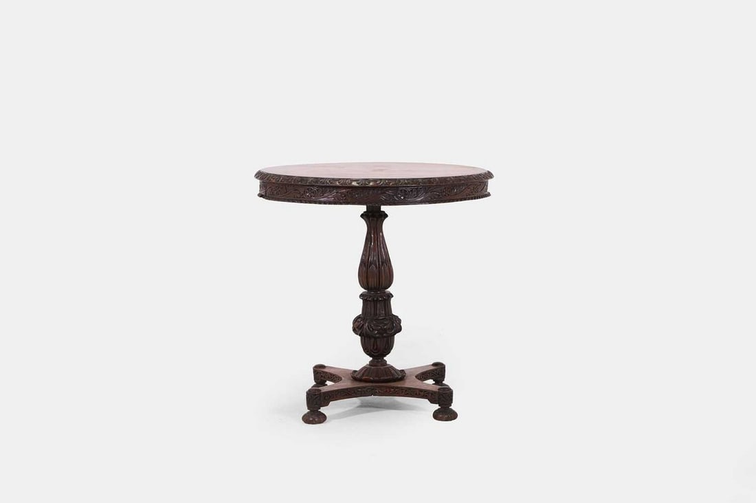 An Anglo-Indian padouk centre table, late 19th/early 20th century, (1 of 3)