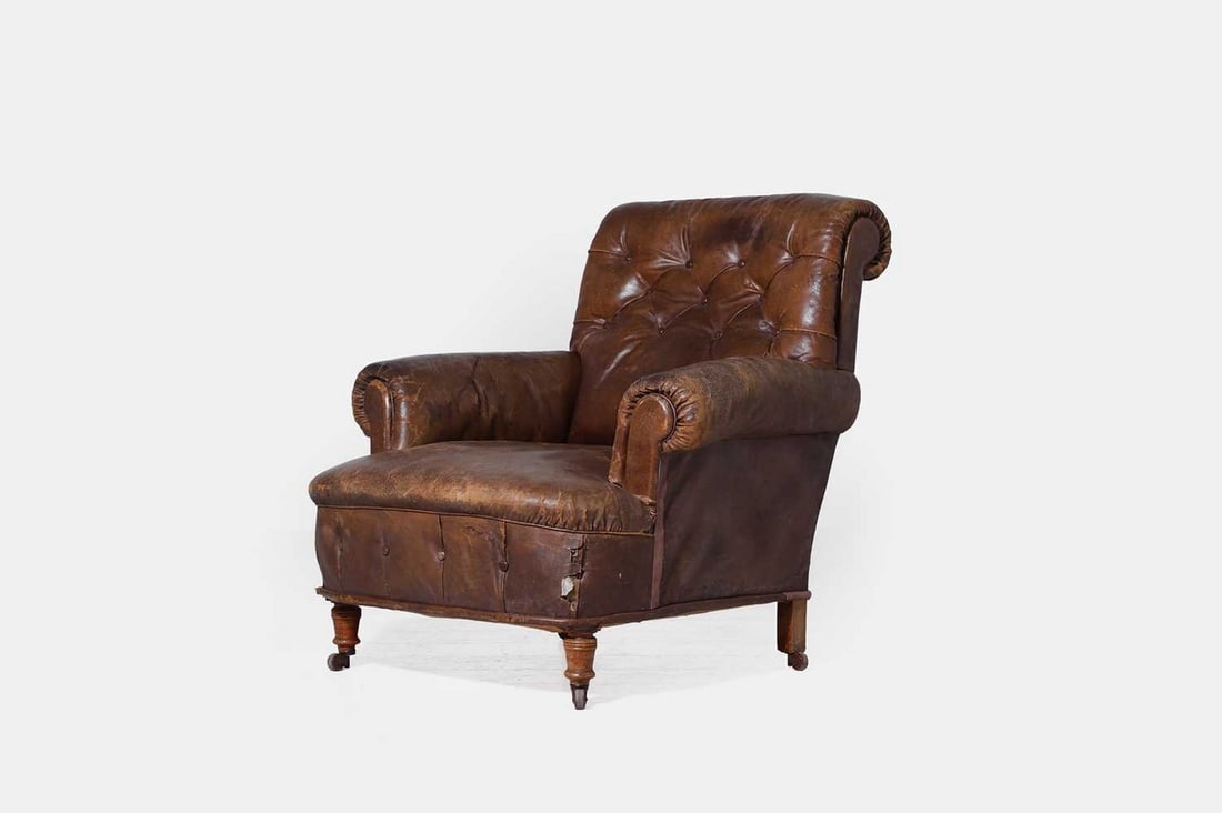 A late Victorian leather club armchair, circa 1890, (1 of 3)