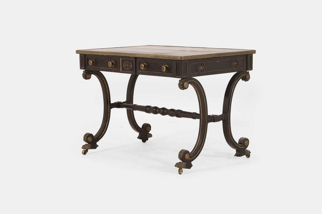 A Regency ebonised and parcel-gilt writing table, circa 1815, (1 of 5)