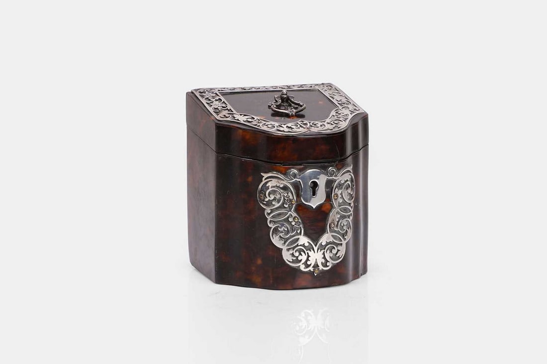 An Edwardian silver-mounted tortoiseshell tea caddy, the silver marked Martin, Hall & Co., (1 of 3)