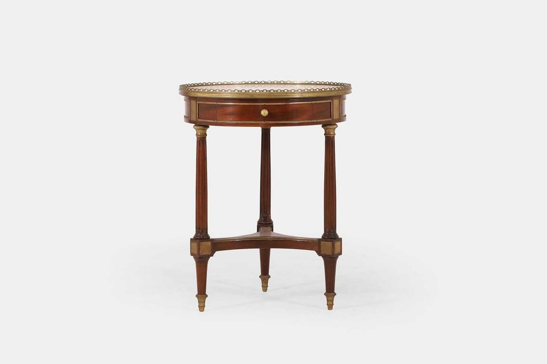 A Louis XVI mahogany bouillotte table, third quarter of the 18th century, (1 of 4)
