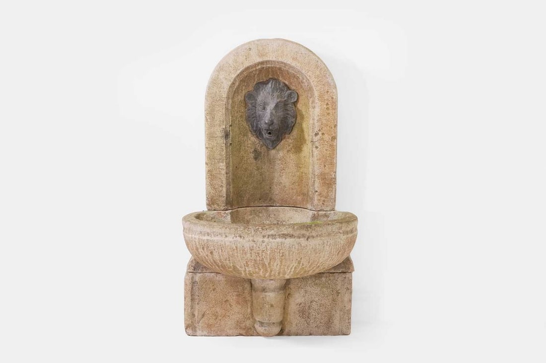 A stone water feature, 20th century, (1 of 3)