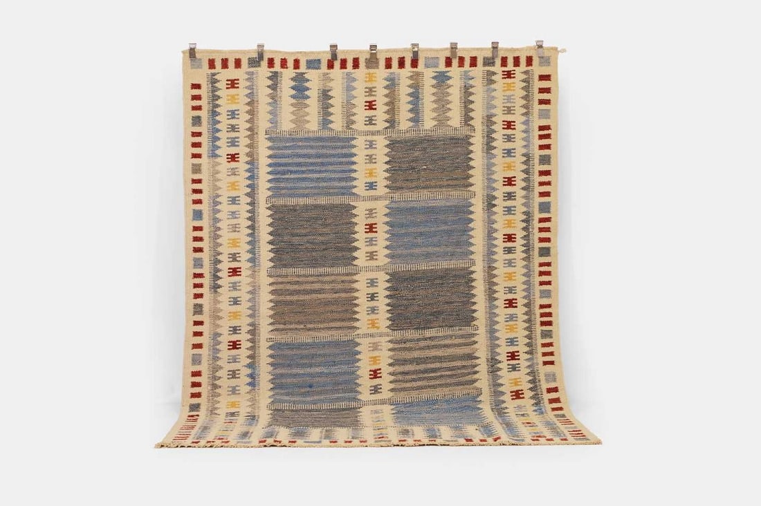 A flat-weave wool carpet in the style of Barbro Nilsson, of recent manufacture, (1 of 3)