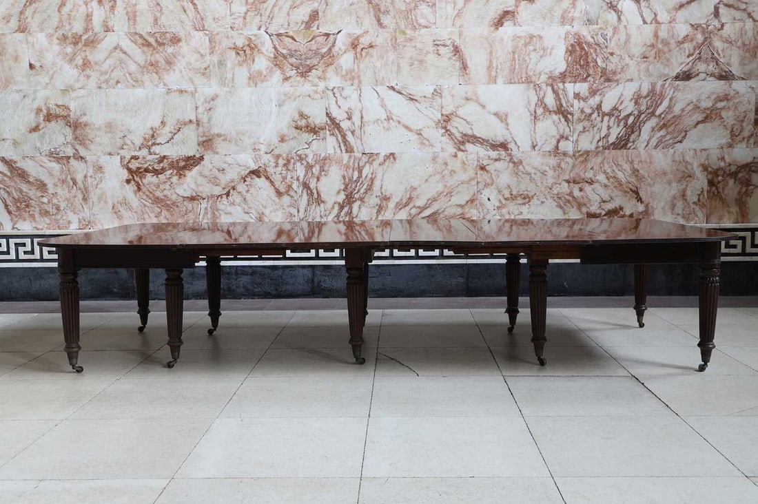 A George IV mahogany extending dining table attributed to Gillows, circa 1825, (1 of 2)