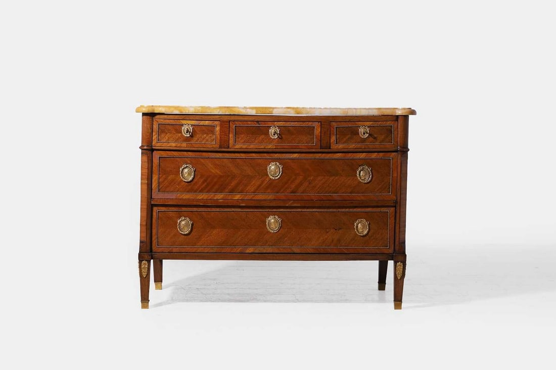 A Louis XVI mahogany and tulipwood commode, late 18th century and later, (1 of 4)