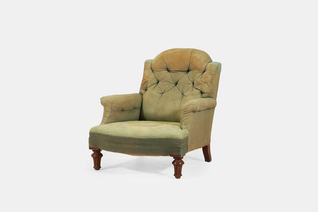 An upholstered mahogany-framed armchair, late 19th/early 20th century, in the manner of Howard and (1 of 3)