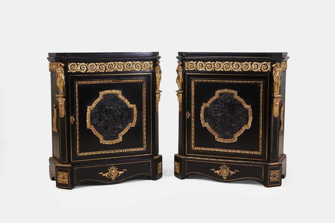 A pair of Napoleon III ebonised and ormolu-mounted pier cabinets, third quarter of the 19th century, (1 of 3)