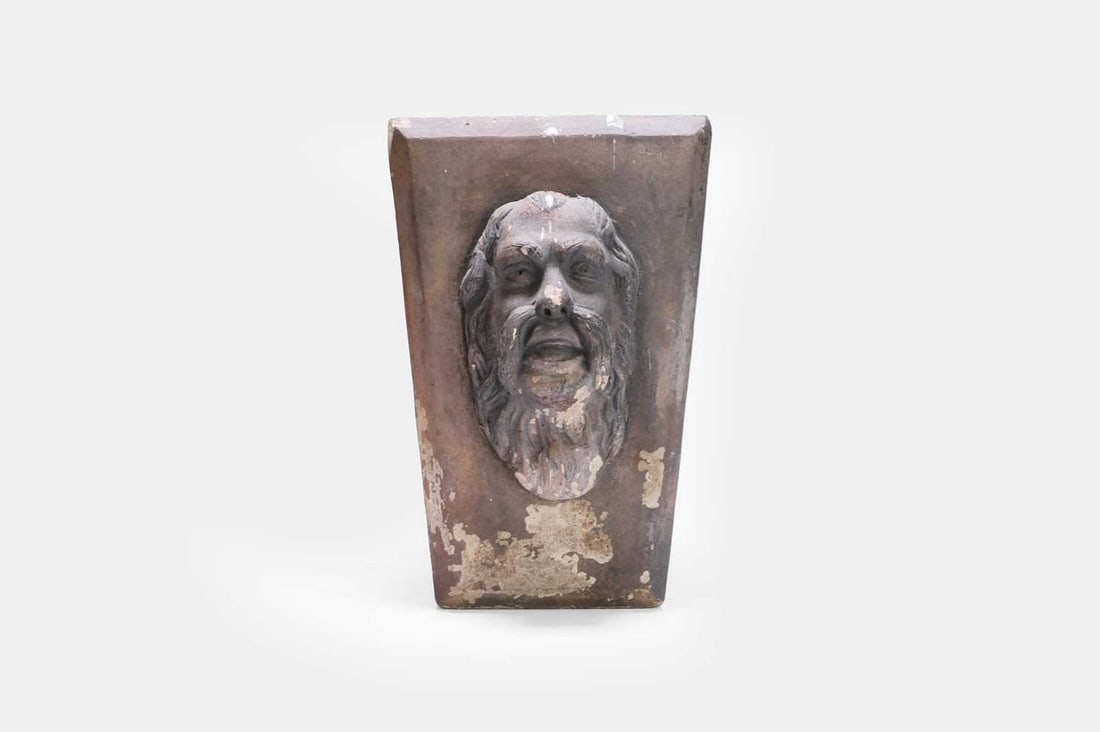 A Victorian blush terracotta keystone in the manner of Coade, 19th century, (1 of 3)