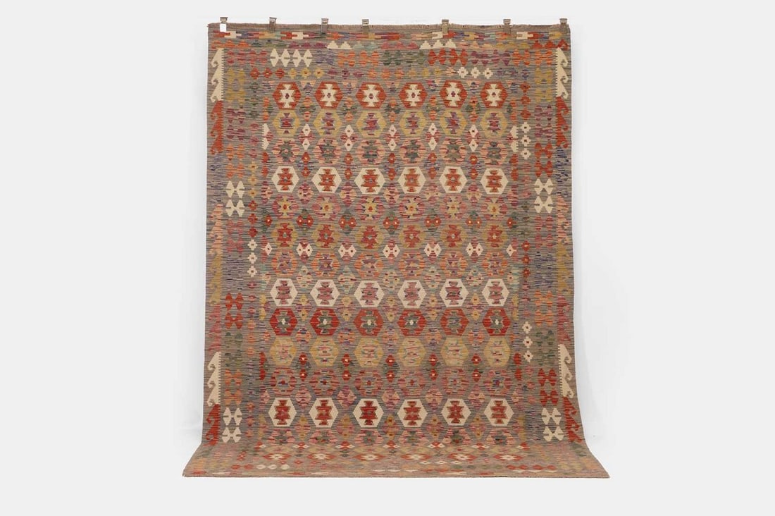 A flat-weave wool carpet of Anatolian design, of recent manufacture, (1 of 3)