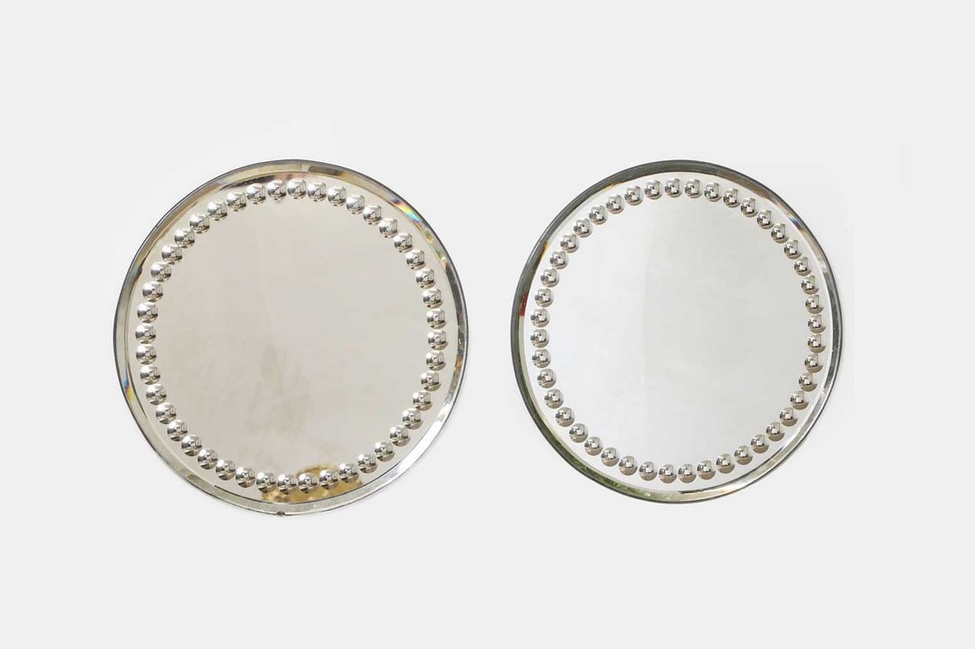 A pair of sorcerers' mirrors, of recent manufacture, (1 of 2)