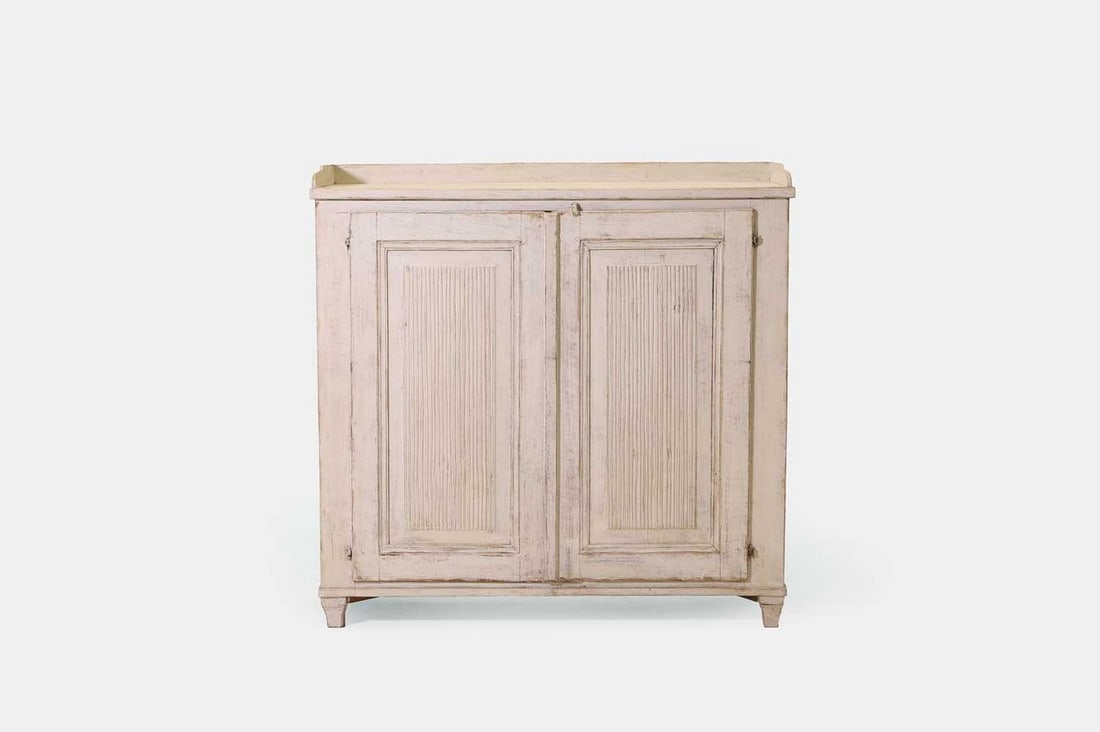 A white painted Gustavian-style cupboard, late 19th/early 20th century, (1 of 3)