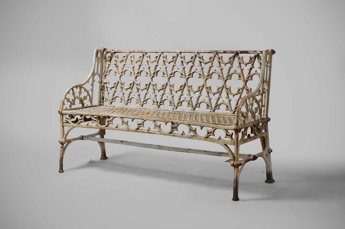 A cast iron garden bench, circa 1900, (1 of 5)